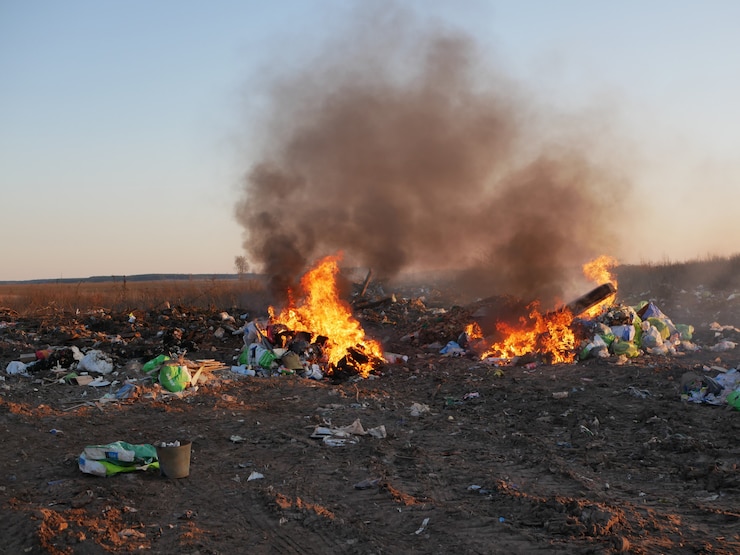 Burning garbage outdoors