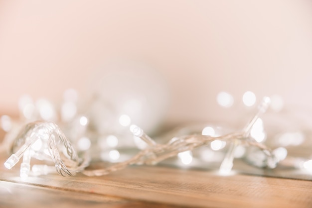 Photo burning garland on table