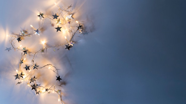 Photo burning garland with spangles on table