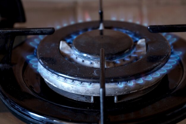 Burning gas on a double-row gas ring on the stove