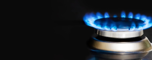 A burning gas stove Black background Copy space