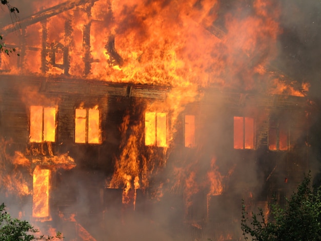 Burning house, Big wooden building completely destroyed by fire