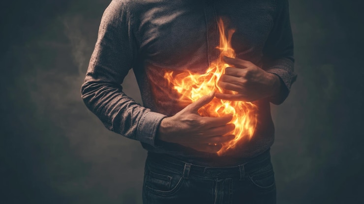 Photo burning stomach sensation fiery pain discomfort