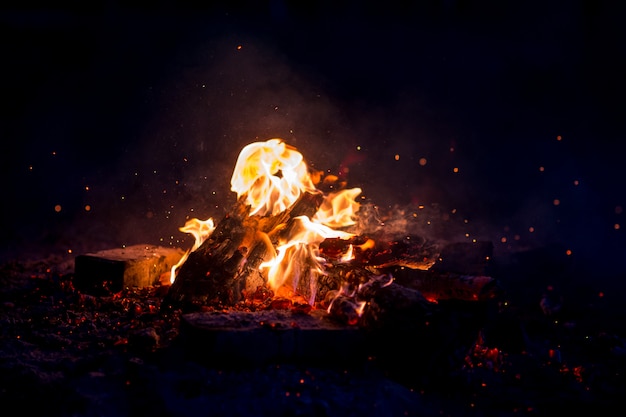 Burning wood at night