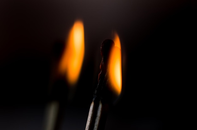 A burning wooden matches closeup