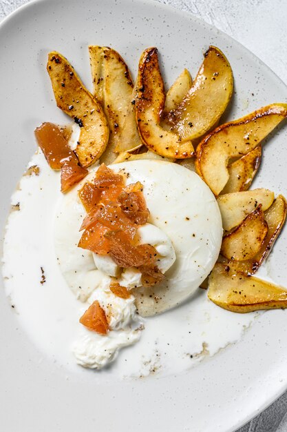 burrata cheese with baked pear and pear marmalade