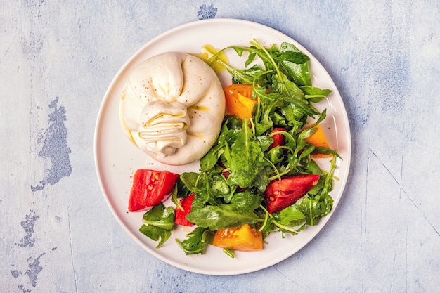 Burrata cheese with fresh salad