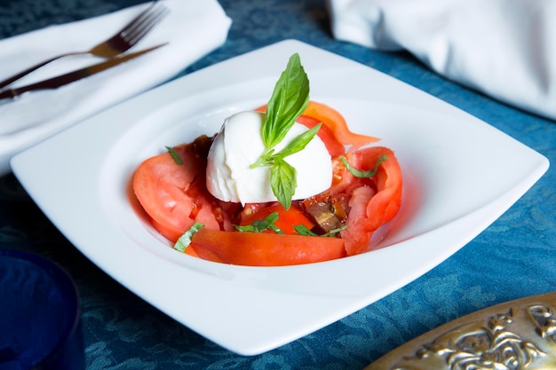 Burrata salad The burrata is a fresh cow's milk cheese with spun paste and round in shape