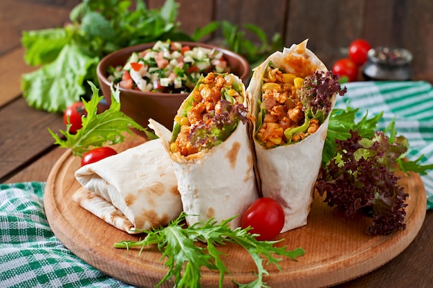 Burritos wraps with minced beef and vegetables