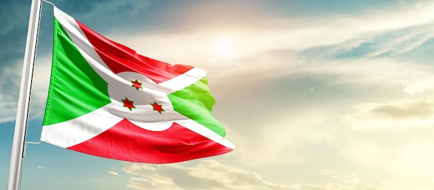 Burundi waving flag in beautiful sky