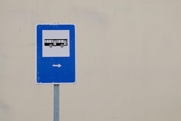 bus stop symbol on the road