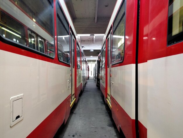 Buses in illuminated underground tunnel