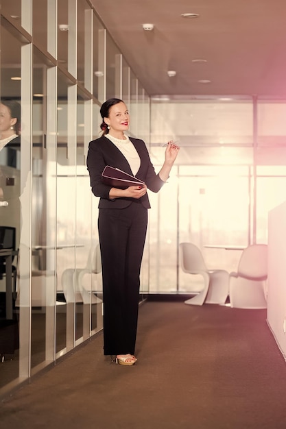 busines woman lawyer or jurist woman manager girl with happy face hold document