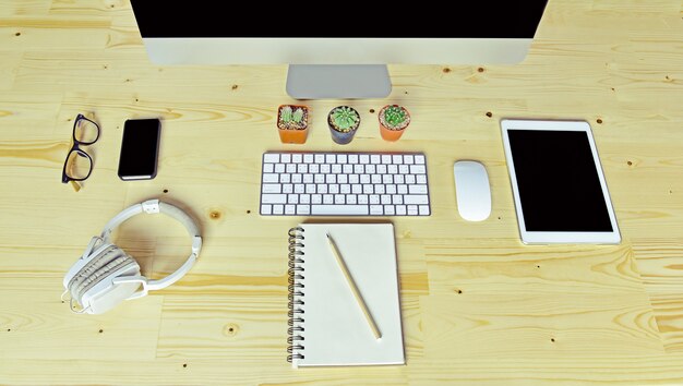 Business accessories on wooden desk