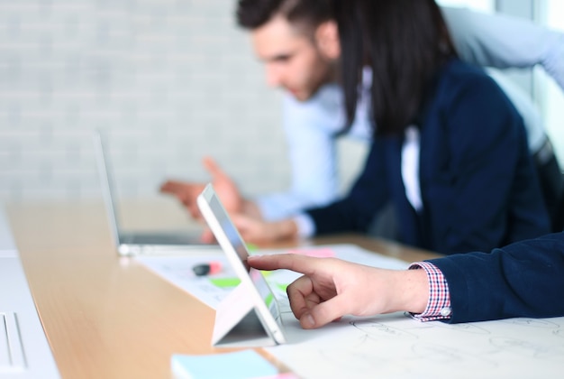 business adviser analyzing financial figures denoting the progress in the work of the company