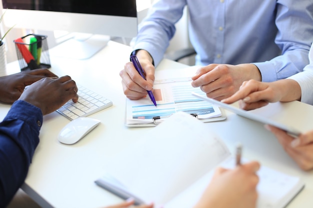 Photo business adviser analyzing financial figures denoting the progress in the work of the company