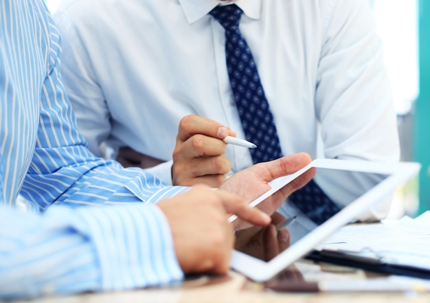 business adviser analyzing financial figures denoting the progress in the work of the company