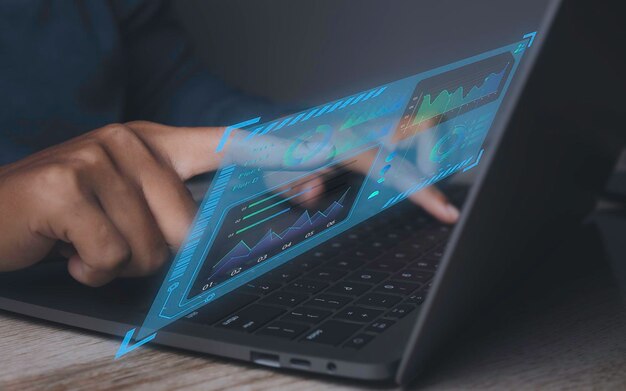 Business analysis Analyst working Data Management System on computer