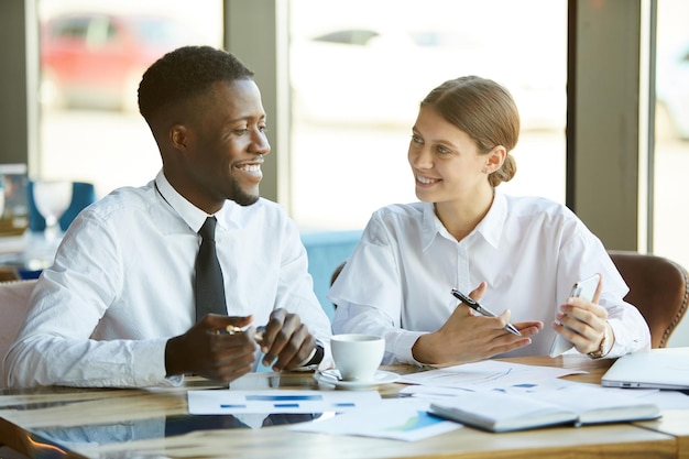 Business analysts working with financial data