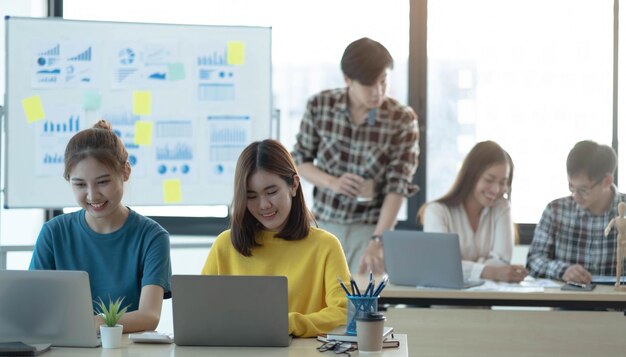 Photo business asian people meeting time working with new startup project idea presentation analyze plans business discussing conceptxa