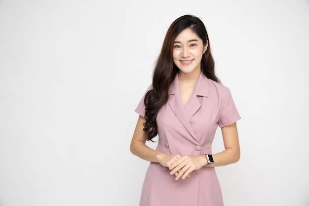 Business asian women in pink dress smiling