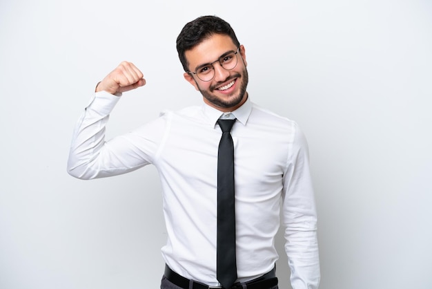 Business Brazilian man isolated on white background doing strong gesture