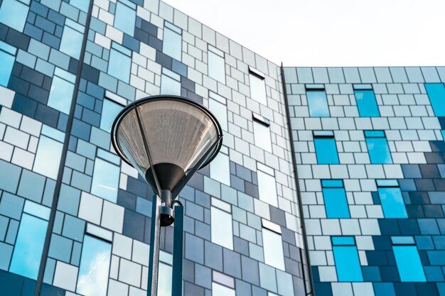 Business building with glass facades against the sky