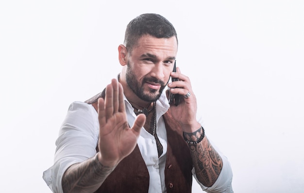 Photo business call man well groomed rich fashionable macho clothes and accessories fashion macho mobile conversation bearded guy white background mafia boss guy handsome mafia boss hold smartphone