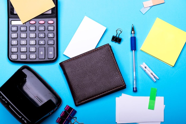 Business card and binders near sticky notes Business accessories