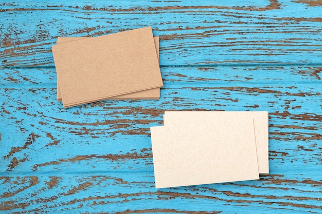 Business card on blue wooden table