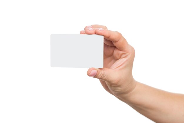 Business card in female hand closeup isolated on white background