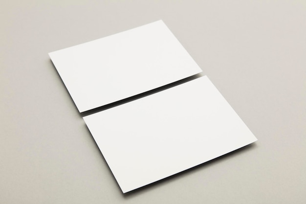 Business card flyer poster mock up white card on a grey background