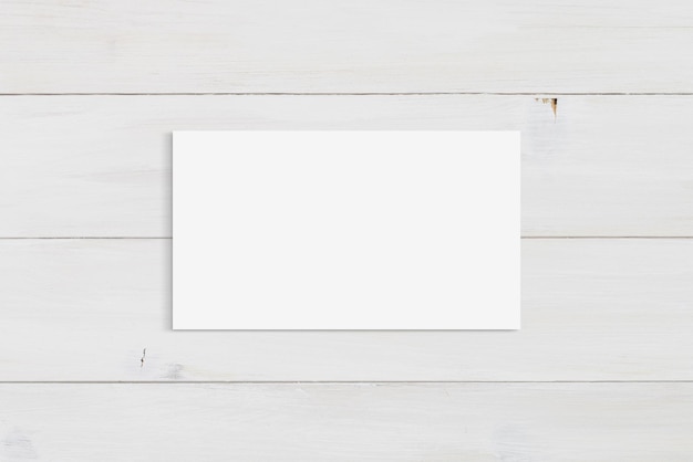 Photo business card mockup on modern white wood background