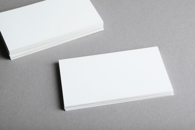 Business cards on a colored background top view place to insert text