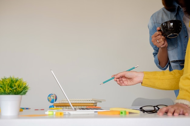 Photo business casual adviser analyzing financial figures