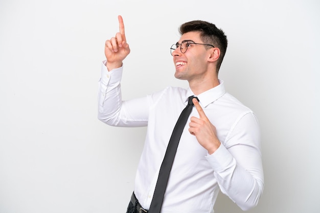 Business caucasian man isolated on white background pointing with the index finger a great idea