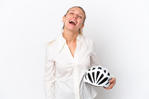 Business caucasian woman with a bike helmet isolated on white background laughing