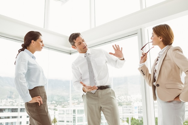 Business colleagues in discussion at office