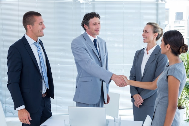 Business colleagues shaking hands