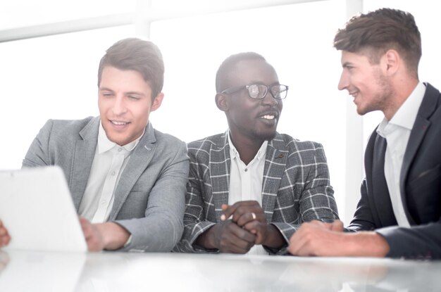 Business colleagues sitting at the Desk