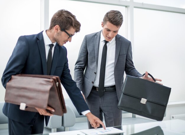 Business colleagues standing in a modern office