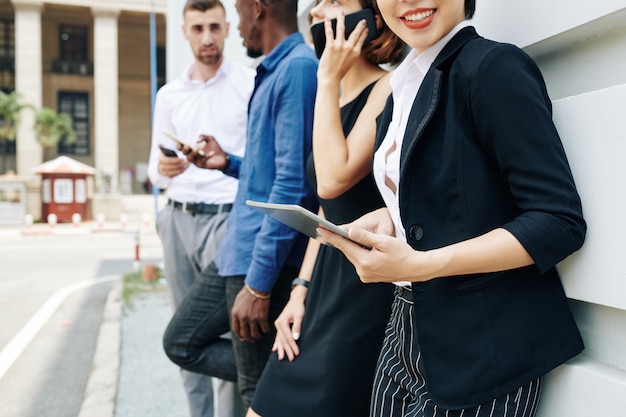 Business colleagues standing outdoors