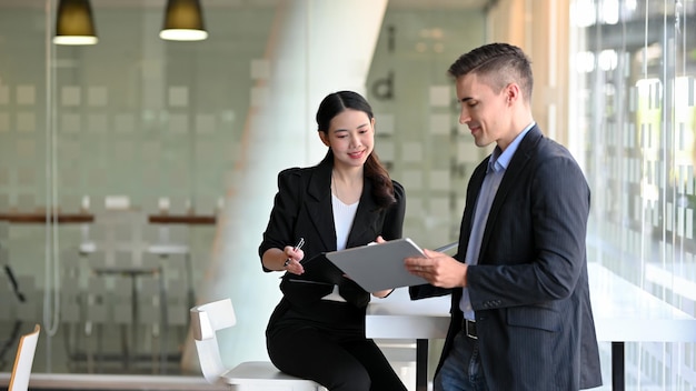 Business colleagues working in office