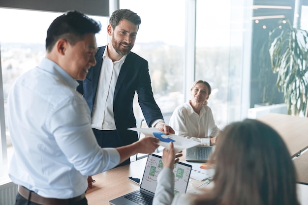 Business colleagues working in office