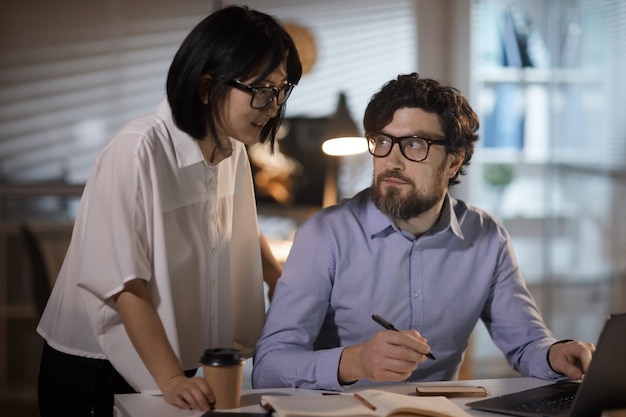 Business colleagues working at office