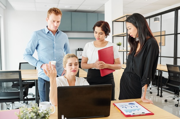 Business colleagues working in team