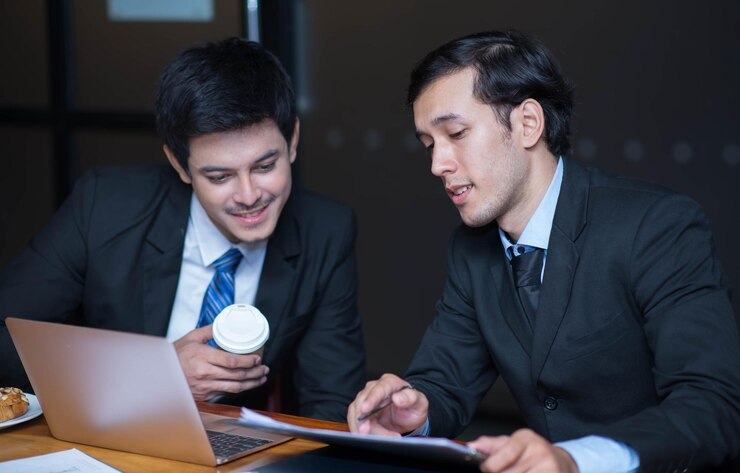 Business colleagues working together in office