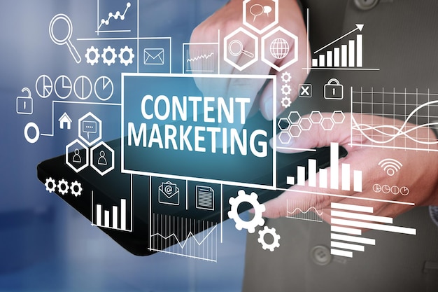 Business Concept Businessman click content marketing button on his tablet