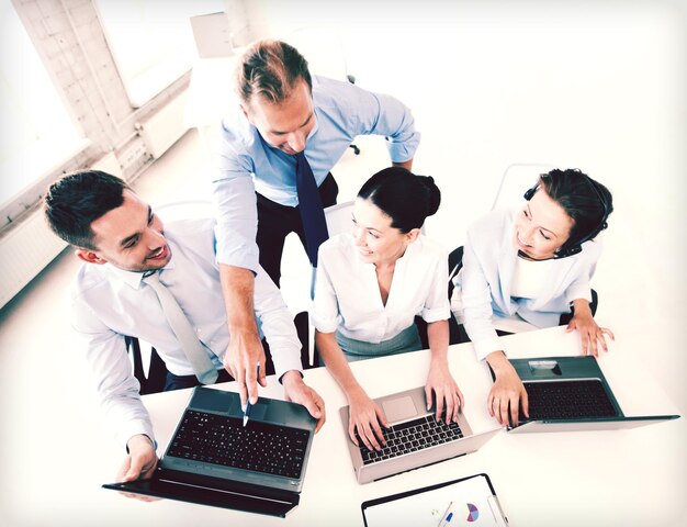 business concept - group of people working in call center or office