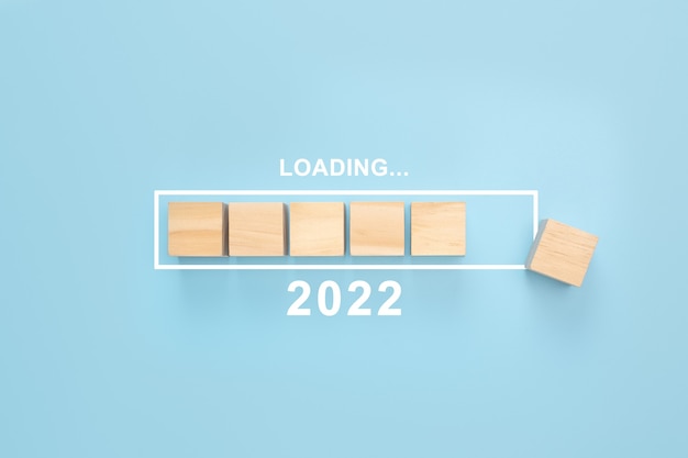 Business concept of planning 2022 Loading new year 2022 cube in progress bar New year start concept